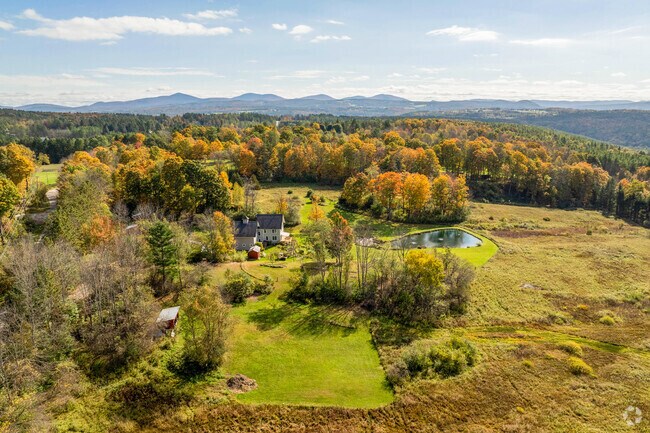 The towering Green Mountains surround the views from Towne Hill.