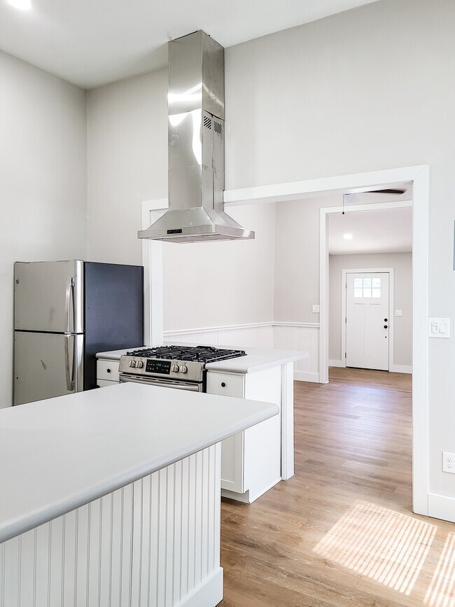 Slide in Gas Range and counter top opening into Living Space