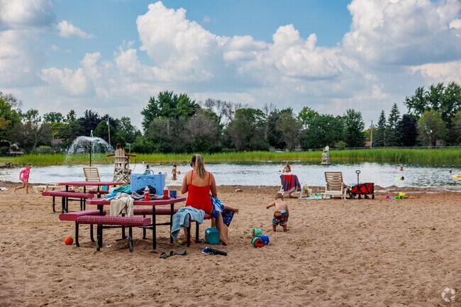 Sunset Park includes a beach swimming area for visitors to cool off on a hot day.