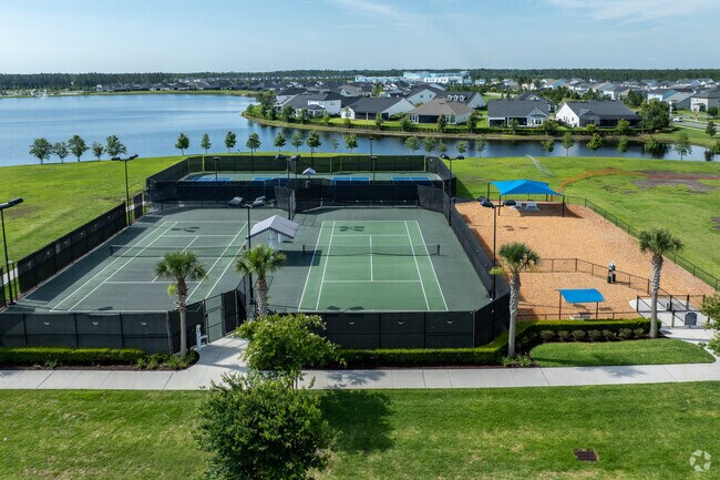 The Beacon Lake Amenities Center also includes tennis and pickleball courts for residents to enjoy.