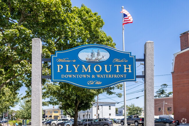 This vibrant blue sign welcomes you to Downtown Plymouth.