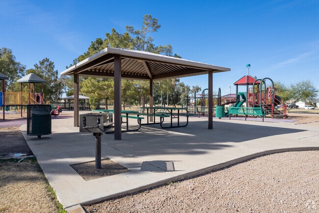 Visitors can use shaded grill areas at Enid Park in Mesa.