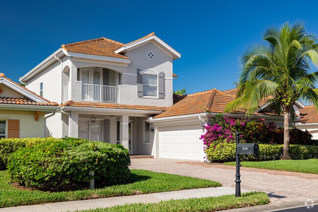 Bridgewater Bay homes offer traditional Florida styling with red tile roofs.