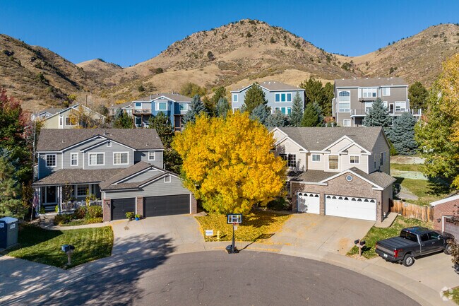 Large Craftsman homes line the foothills of Golden Gate Canyon.