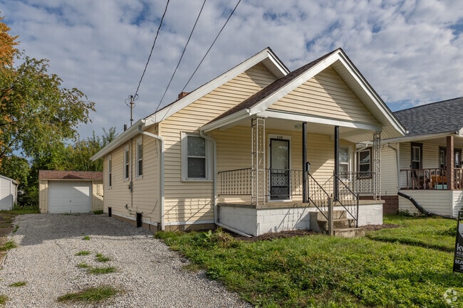 In East Akron, rows of quiet ranch homes are nestled between trees.