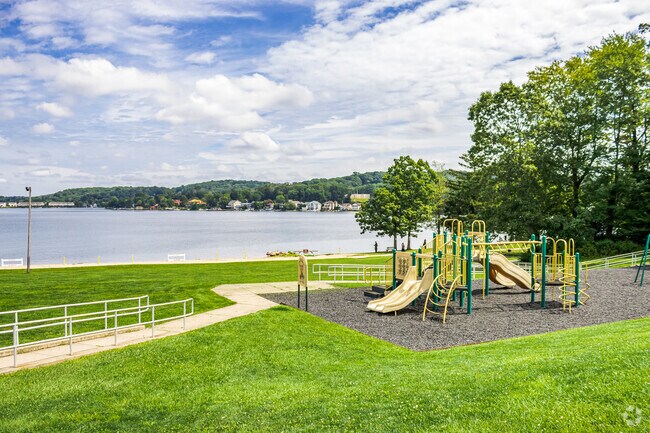 Hopatcong State Park features a playground on the water for families in
Mt. Arlington