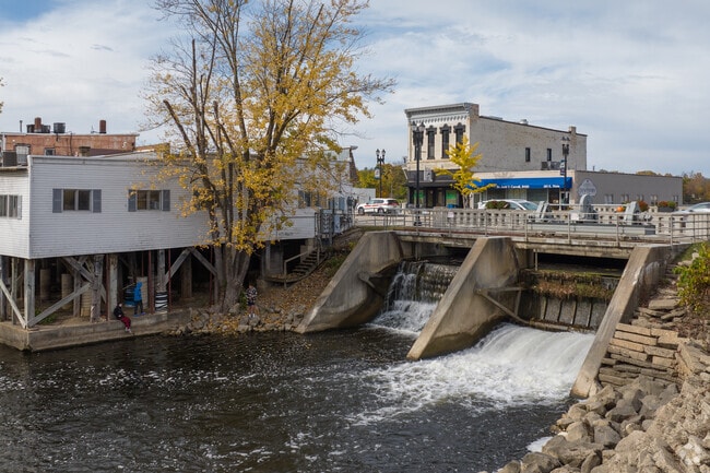The Flat River running through downtown Lowell is a popular fishing spot.