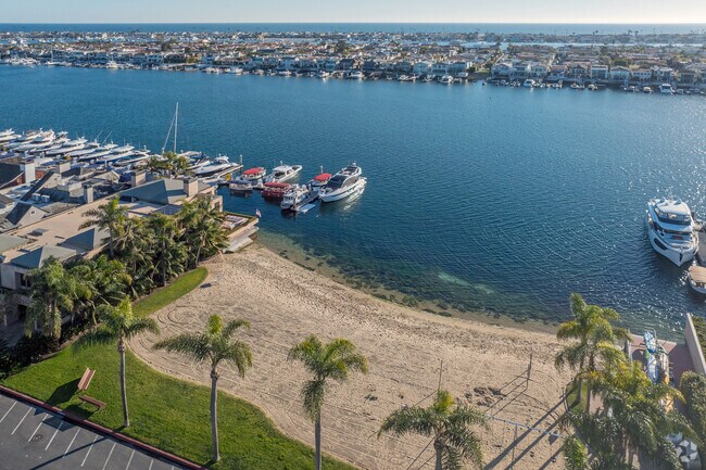 Bayshores residents enjoy their choice of two private beaches on the bay.