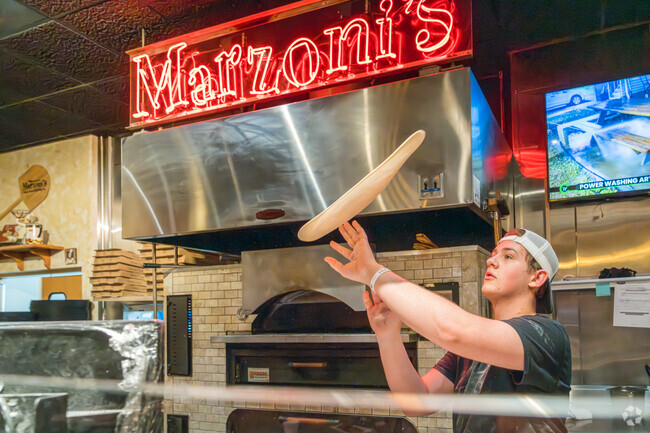 Viral pizza dough kid works at Marzoni's making it a joy to watch in Lower Allen.