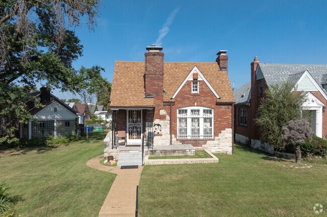 Tudor-inspired homes in Penrose have wrought-iron adornments.