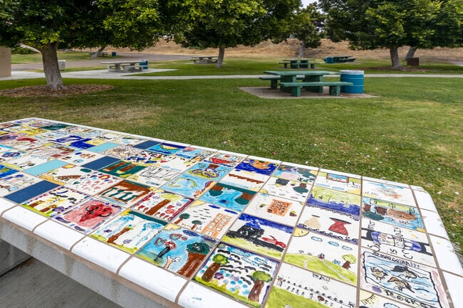 Colina Del Sol Park near El Cerrito showcases community art on its hand painted picnic tables.