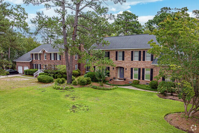 Traditional brick homes in Woodberry Forest sit on quarter-acre lots or larger.
