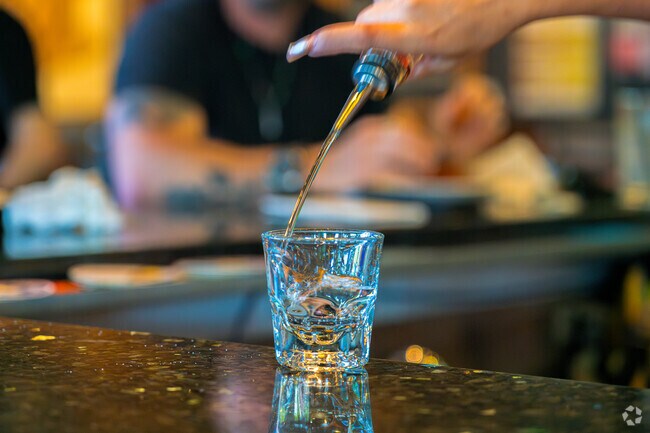 Stop by Kick'n Mule Sports Bar for a shot while watching the game.