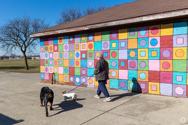 Colorful murals adorn buildings throughout Buffalo Charles.