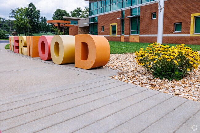 The Sherwood Elementary School campus incorporates a woodland theme into the architecture.
