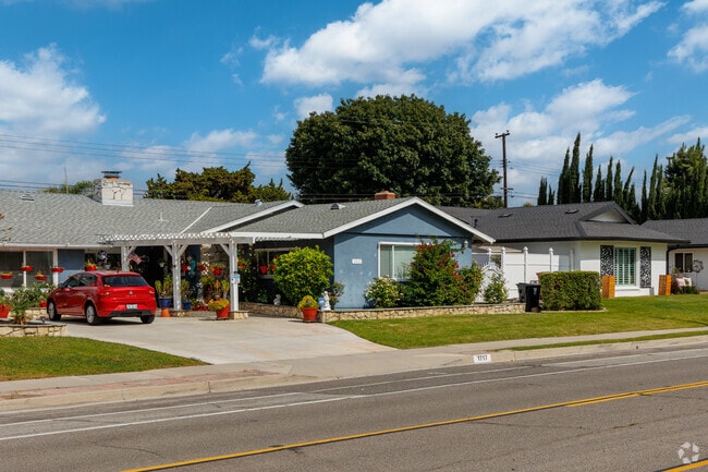 Ranch homes on a gentle slope typical of the Rolling Hills neighborhood.