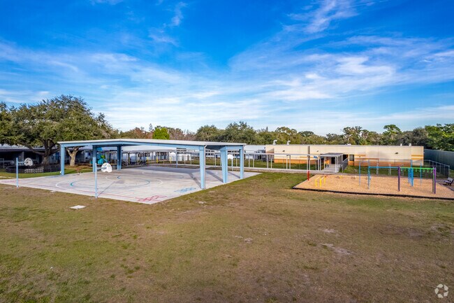 Kids can enjoy the playground & basketball courts on breaks at Blanton elementary school.