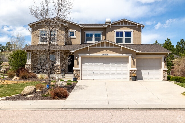 Three car garages are common in the Flying Horse Ranch neighborhood.