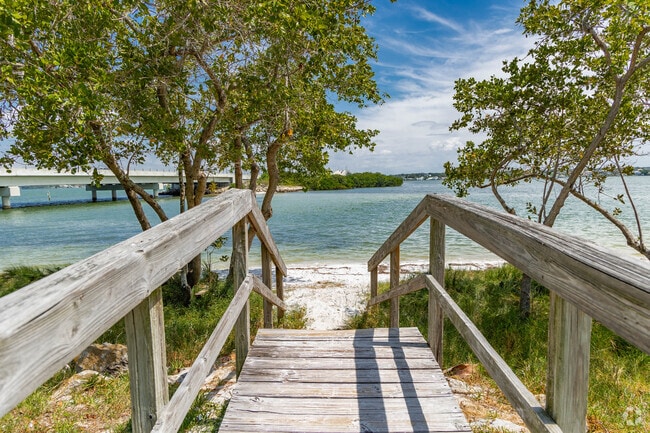 Listen to the waves lapping at the shore of the white sand beach near Belleair Bluffs.