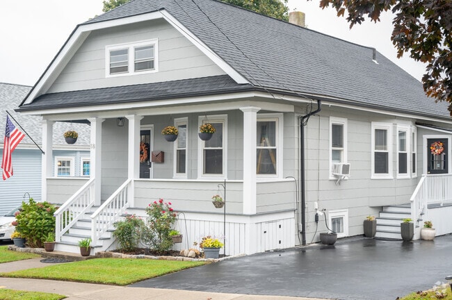One can appreciate the charm of rainy days from the comfort of a front porch in North Fairhaven.