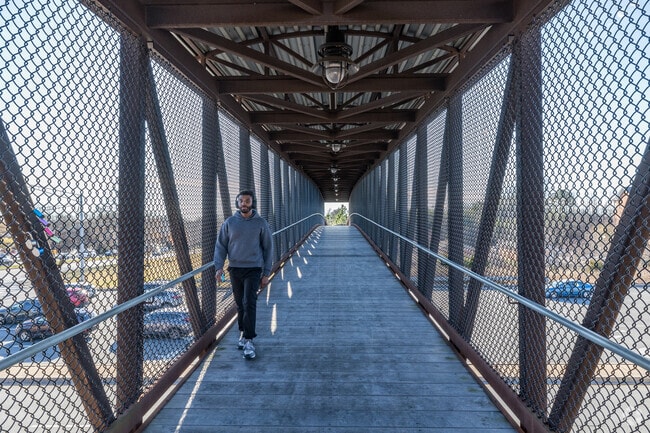 Residents of Heather Hills enjoy convenient access to amenities via the pedestrian bridge.