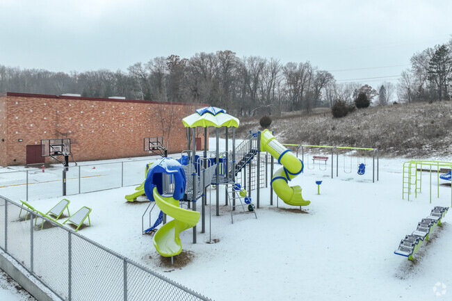 Pine Bend Elementary School has a large enclosed playground.