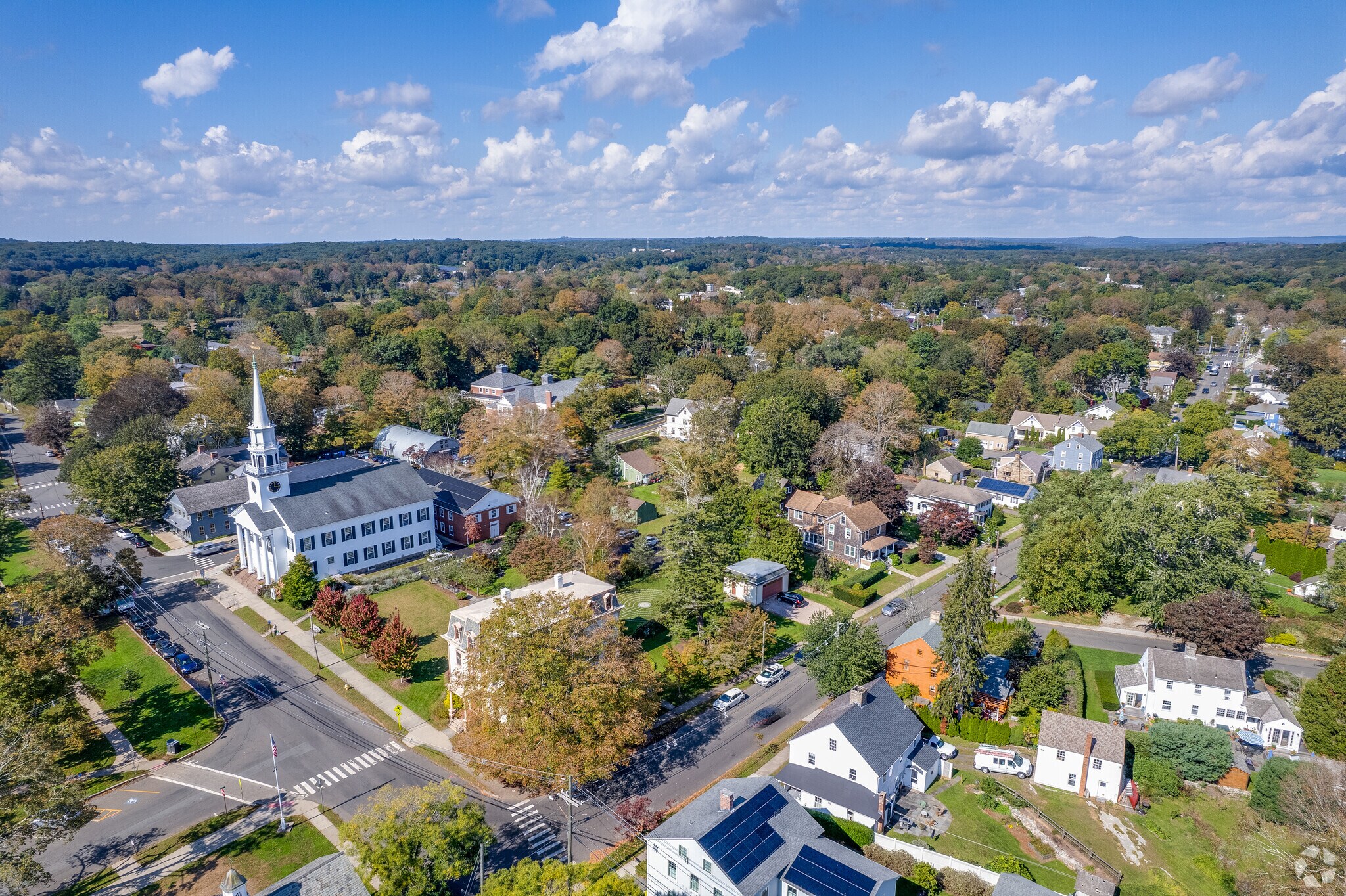 Serene residential area in Guilford with various homes nestled among lush greenery.