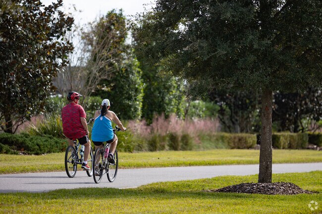 eTown residents enjoy biking on the wide sidewalks.