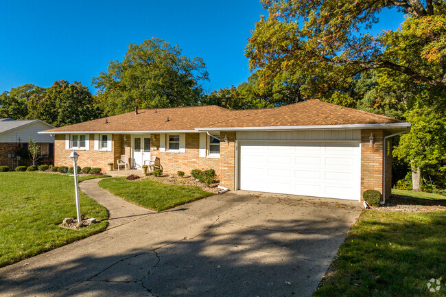 Single-story brick home with attached garage in the South of Broadway neighborhood of Peoria, IL