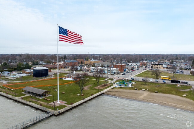 Walter & Mary Burke Park anchors the waterfront with lake views and annual events.