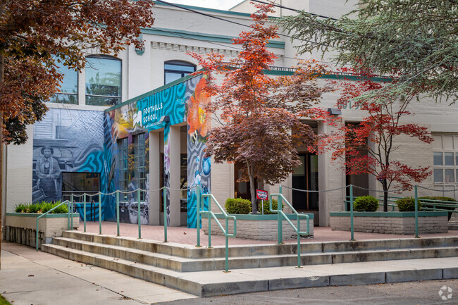 Study on the steps of Foothills School of Art and Science in downtown Boise.