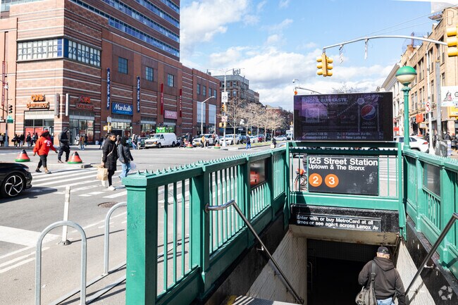 The 125th Street, Lenox Ave stop in Central Harlem offers express service uptown and downtown.