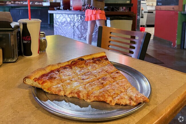 Arizona Pizza Company offers cheap lunch specials with big slices in Vail.