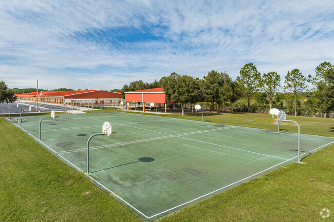 Students enjoy outdoor play on the sports courts at New River Elementary.