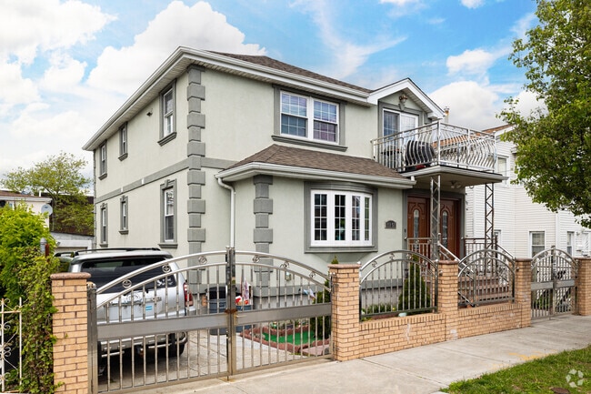 Modern single-family homes can be found in Rochdale, Queens.