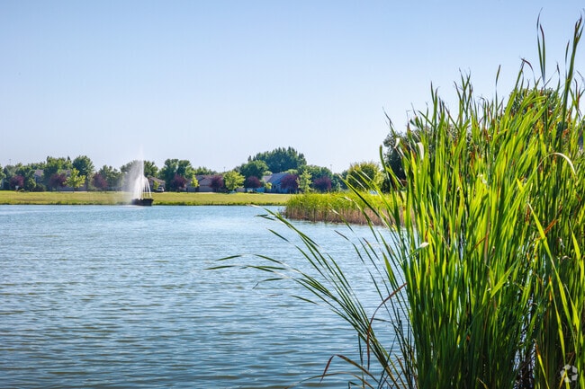 Take a relaxing stroll around the lake at Charleswood Park near Tintes.