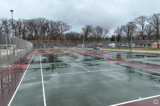 Students love playing tennis at Barker Middle School.