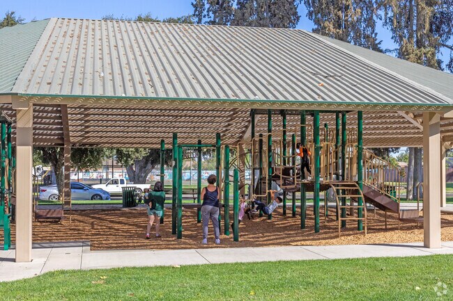 Kids enjoy the shaded playground at Houlihan Park in the Le Grand area.