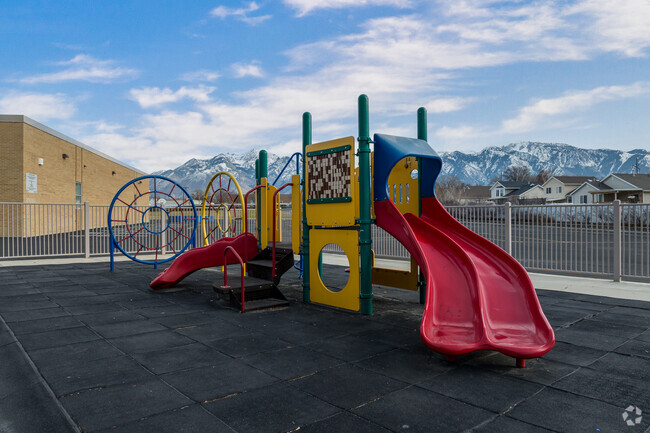 A colorful playground sit on soft turf at Copperview Elementary School.