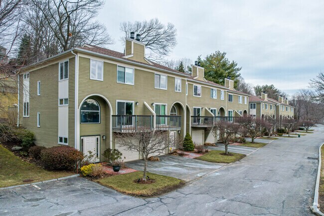 Some condominium homes in Newton Corner have garages on the first level.