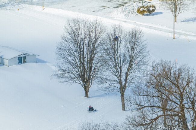 In winter, you can hear snowmobilers cruising the trails at Clymer Community Park.