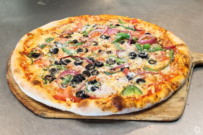 For a truly authentic experience, head to Pizza New York Margherita near Meadows At Morris Farm.