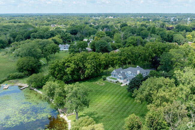 Located in East Palm Beach at Brandenburg Lake is a traditional style home.