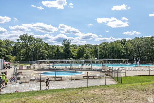 Residents enjoy the public pool at Dix Hills Park in Dix Hills.