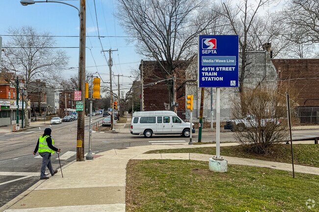 Residents hop on a train at 49th Street Station to head to Center CIty from Cedar Park.