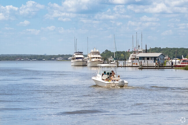 Boating on the Dog River is a fun activity for Cypress Shores residents.