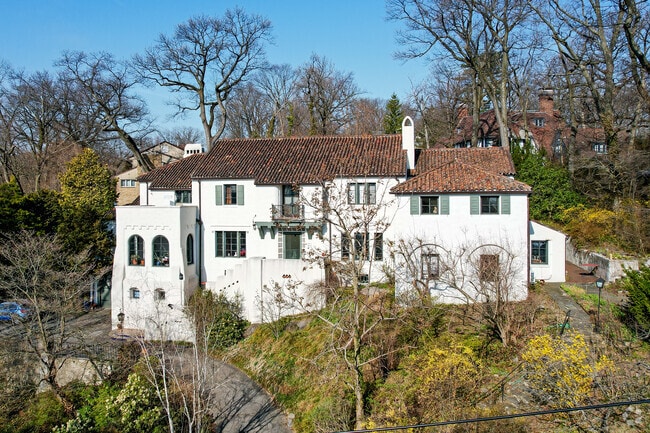 Mediterranean revival style home is a gorgeous old-fashioned design in Riverdale.