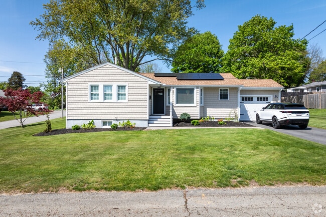 The North Tiverton neighborhood features lovely ranch style homes with well maintained yards.