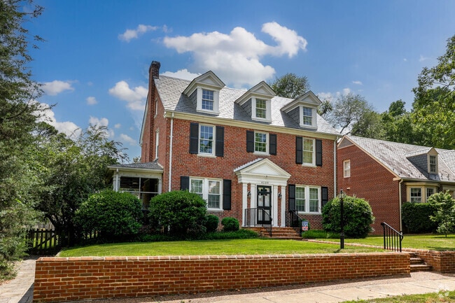 This grand Colonial Revival styled home has a covered entrance located in Colonial Place.