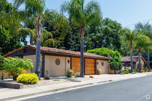 Spanish-style charm meets California sun in this inviting Palos Verde Area cul-de-sac.